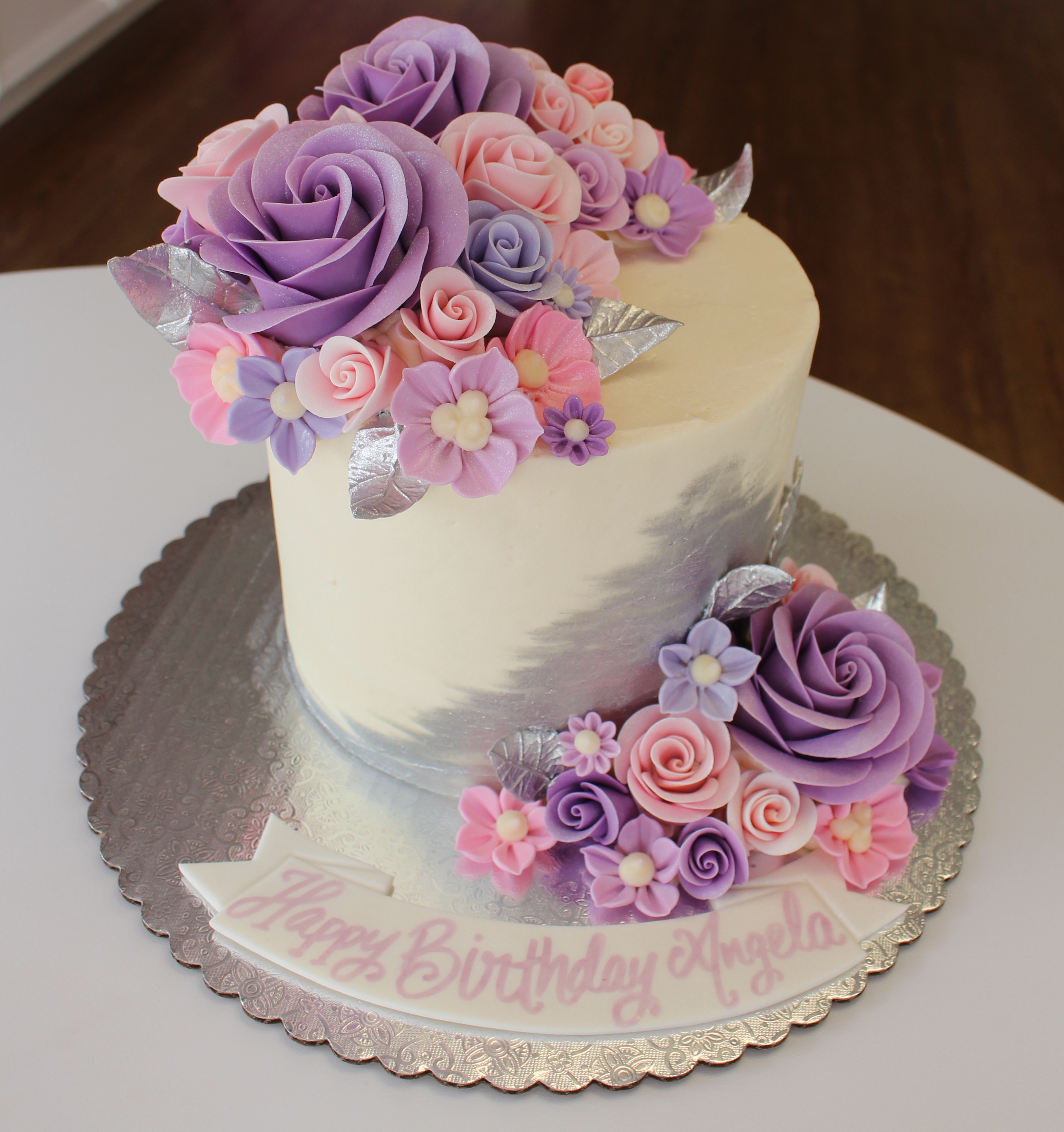 Silver and White Elegant Cake with Purple and Pink Fondant Flowers