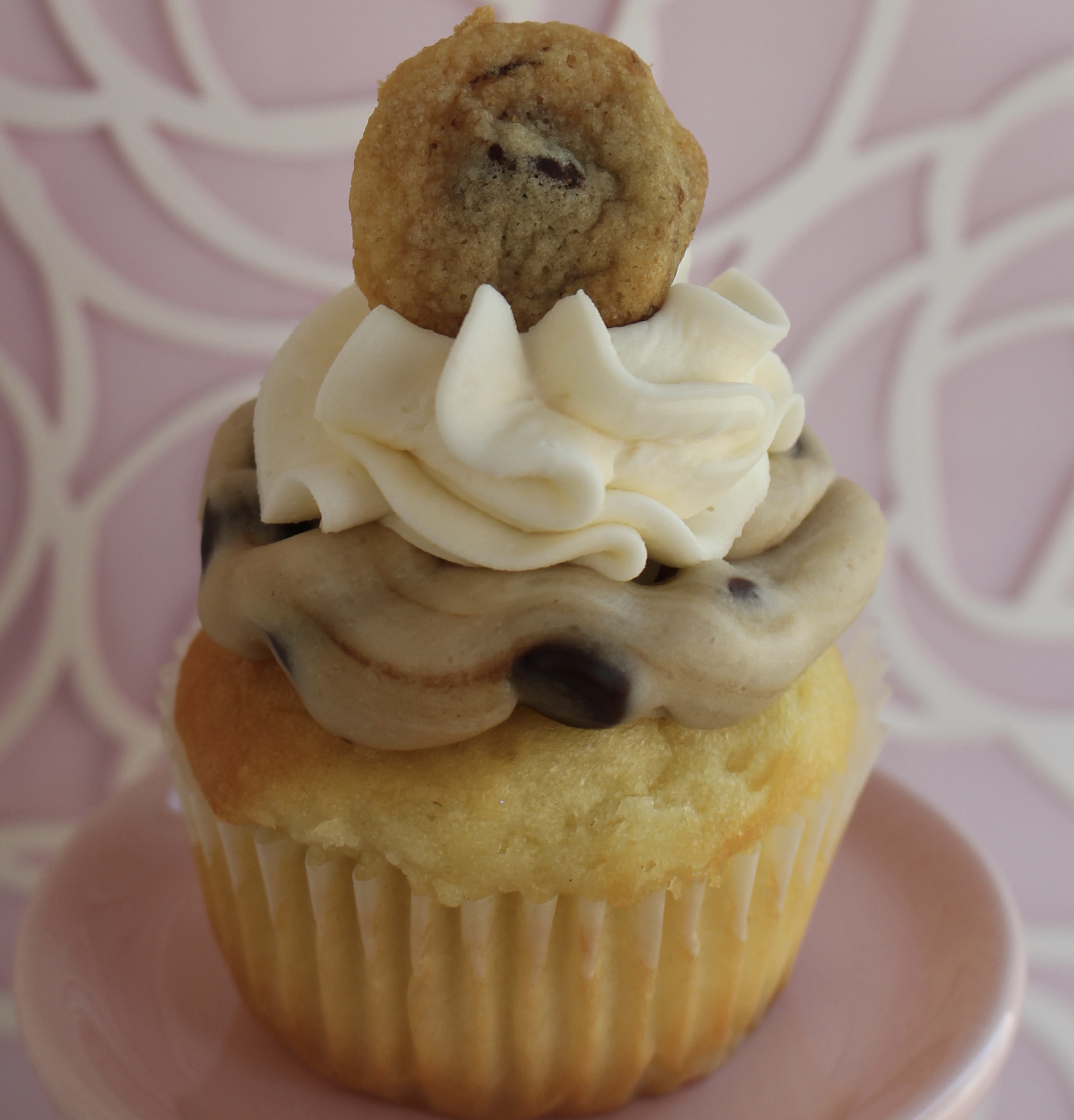 Vanilla cake with a cookie dough buttercream topping and a mini cookie!